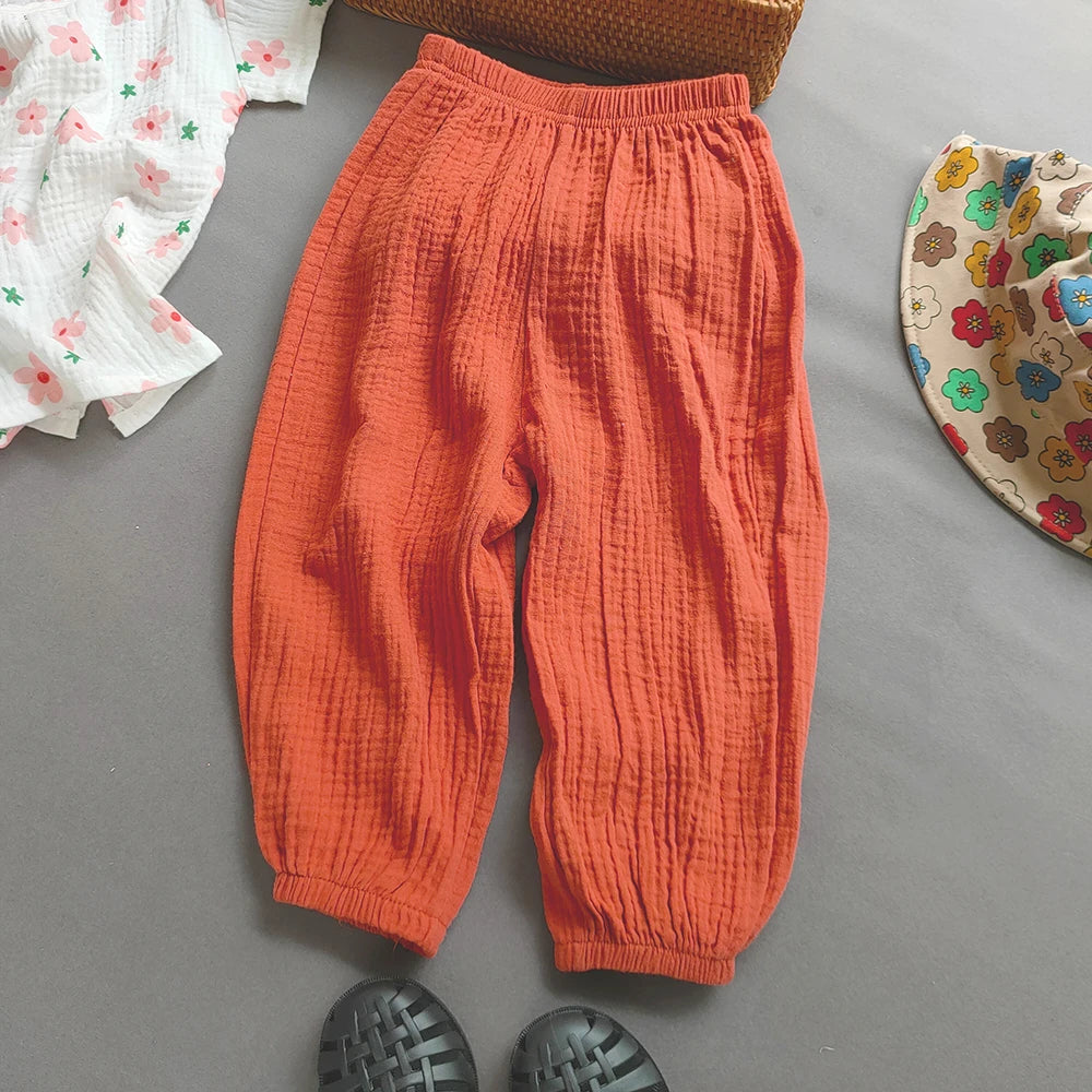Pantaloni cargo da bambina colore rosso ruggine