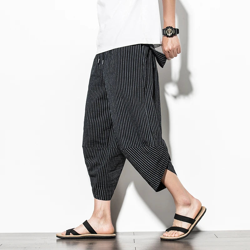 Pantaloni cargo larghi colore nero a righe
